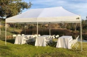 Tent Package 1 Tent 10×20 (3) 6ft tables (18) Folding chairs (3) Tablecloth poly (black & white)